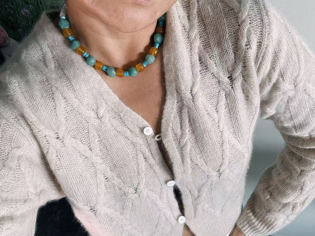 Turquoise Tide Necklace styled on body image 1 1 ec6e84fdef72e52243a30c77b946a5c8.jpg