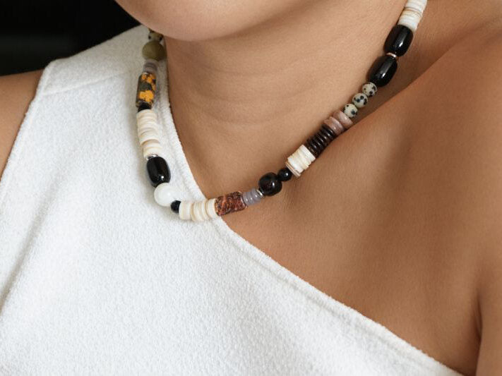Mixed natural stone necklace worn close to the neck